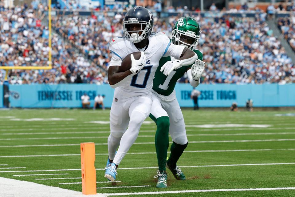 NASHVILLE, TENNESSEE - SEPTEMBER 15: Calvin Ridley #0 of the Tennessee Titans rushes for a touchdown during the first quarter against the New York Jets at Nissan Stadium on September 15, 2024 in Nashville, Tennessee. (Photo by Wesley Hitt/Getty Images)