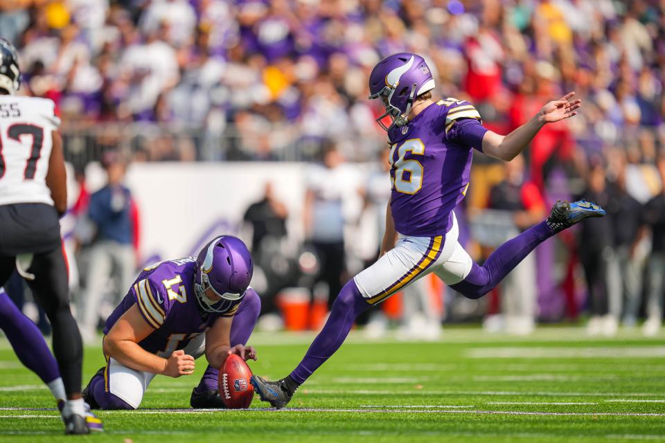 Sep 22, 2024; Minneapolis, Minnesota, USA; Minnesota Vikings place kicker Will Reichard (16) kicks a field goal against the Houston Texans in the fourth quarter at U.S. Bank Stadium. Mandatory Credit: Brad Rempel-Imagn Images