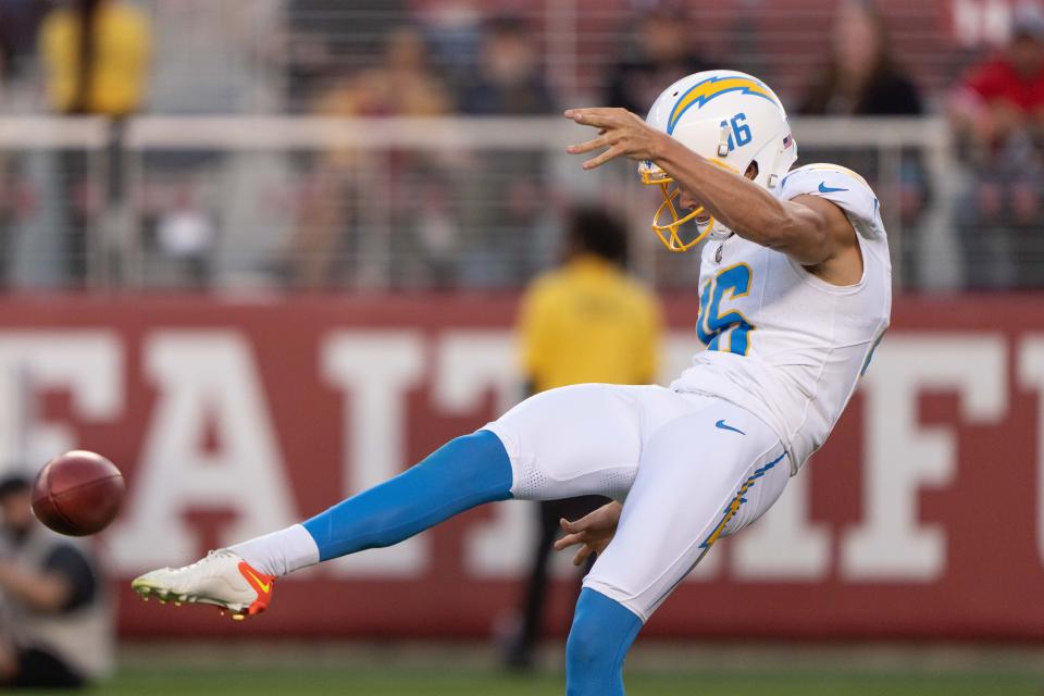 Aug 25, 2023; Santa Clara, California, USA; Los Angeles Chargers punter JK Scott (16) kicks the ball during the first quarter against the San Francisco 49ers at Levi's Stadium. Mandatory Credit: Stan Szeto-USA TODAY Sports