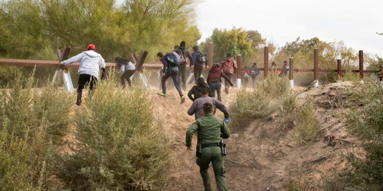 A group of migrants is apprehended by Yuma Sector Border Patrol. (File photo by Jerry Glaser/Customs and Border Patrol)