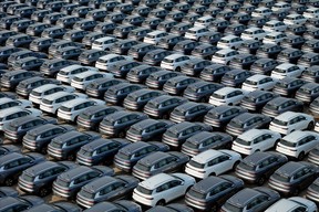 This photo taken on April 18, 2024 shows BYD electric cars for export waiting to be loaded onto a ship at a port in Yantai, in eastern China's Shandong province