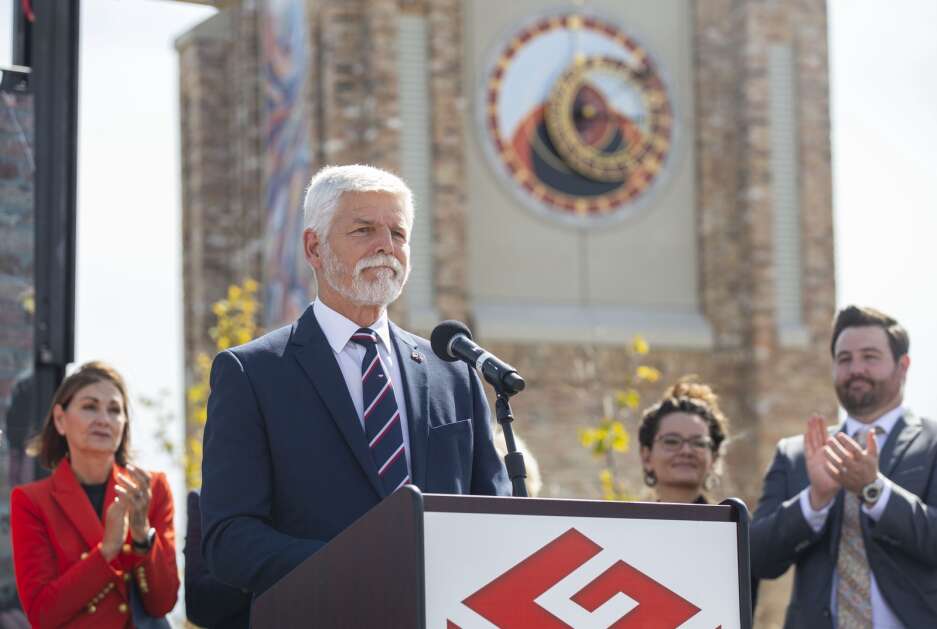 Czech Republic President Petr Pavel looks to the crowd as he is welcomed during the dedication of the Buresh Immigration Clock Tower in Czech Village in Cedar Rapids on Friday. (Savannah Blake/The Gazette)