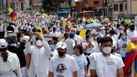 EPA People participate in a march that rejects and calls for the end of the 