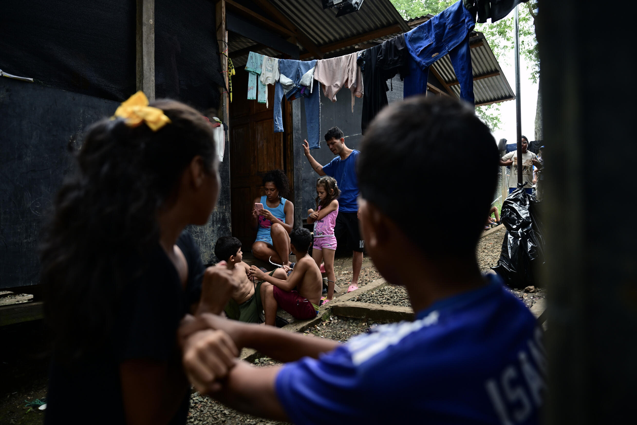 Migrants rest at reception center after crossing the Darien jungle, and aid groups provide basic services before the arrivals continue their journey