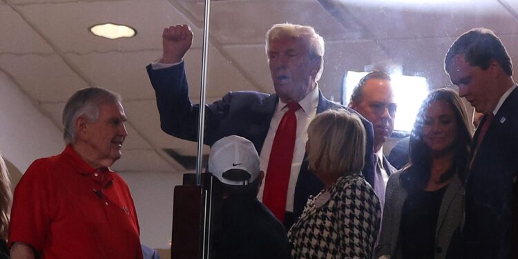 Trump arrives at Alabama-Georgia game to chants of 'USA,' 'Four more years'