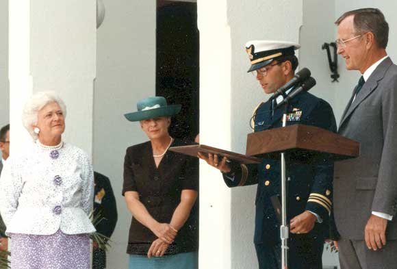 Wayne Justice reads a citation at a Rose Garden event with Barbara and President Bush looking on. (Image for SpaceCoastDaily.com)