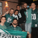 Members of the Eagles Brasil group, including Renan Oliveira (center,  No. 9 Nick Foles jersey) and Alexandre Branco (left of center, No. 91 Fletcher Cox jersey), meet up at a watch party for Super Bowl LII in 2018 in São Paulo.