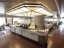 The dining room inside the MV Isabelle X, a ship retrofitted to house more that 600 workers.