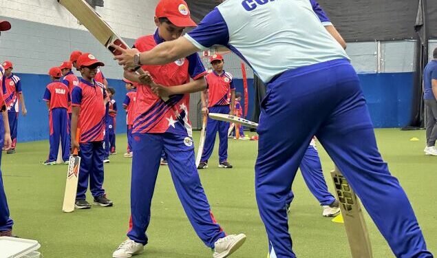 A man wearing a tshirt that says