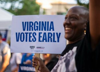 a voter works on his ballot at a polling station at the elena bozeman government centre in arlington virginia on september 20 2024 early in person voting for the 2024 us presidential election began in virginia south dakota and minnesota photo afp