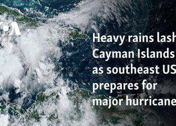 Heavy rains lash Cayman Islands as southeast US prepares for major hurricane 