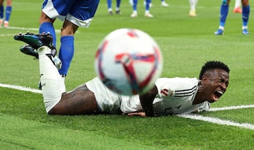 Vinicius Junior reacts after sustaining an injury.