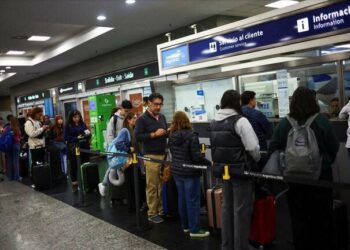 stranded passengers wait in line at the aerolineas argentinas customers service office at the aeroparque jorge newbery airport during an aviation unions strike in buenos aires on sept 13 2024 photo reuters