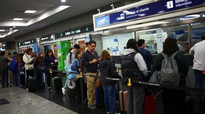stranded passengers wait in line at the aerolineas argentinas customers service office at the aeroparque jorge newbery airport during an aviation unions strike in buenos aires on sept 13 2024 photo reuters