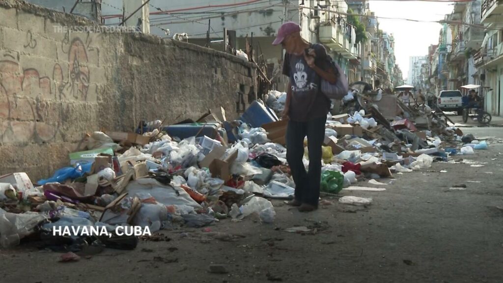 Shortage of water and uncollected garbage add to the daily hardships in Havana