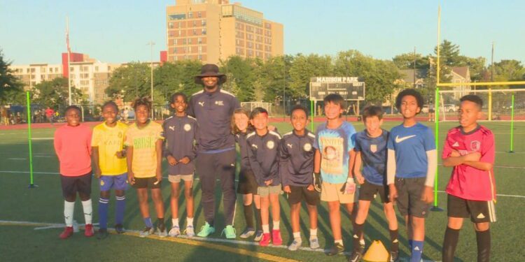 Soccer coach teaches kids love of the game after injury ended his playing career