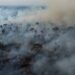 An aerial photos shows a wildfire burning through a jungle in the Amazon.