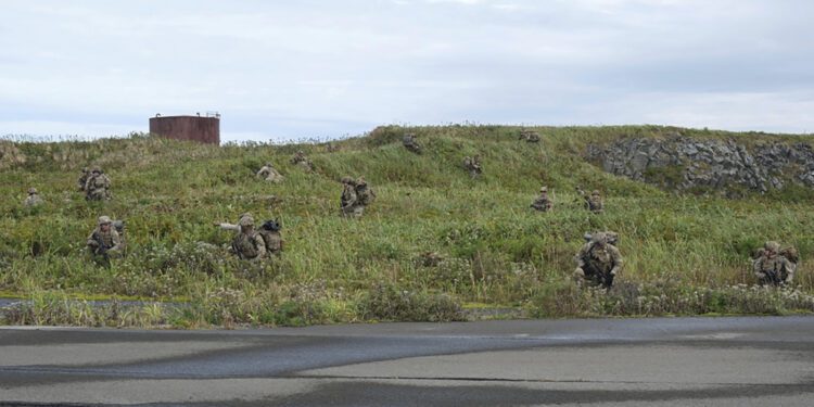 In this image released by the U.S. Army, U.S. Army soldiers assigned to 1st Battalion, 501st Parach...
