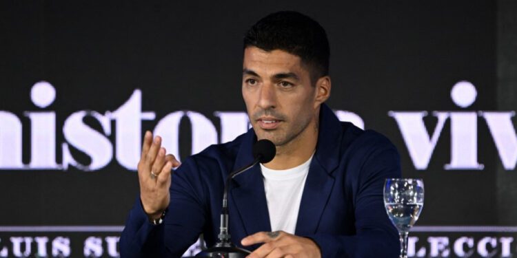 Suarez speaking at a press conference at the Centenario Stadium in Montevideo. Photo: AFP