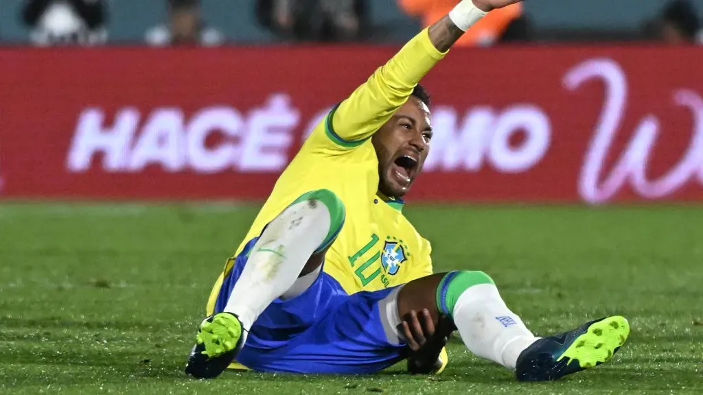 Neymar Jr. of Brazil reacts after being injured during the FIFA World Cup 2026 Qualifier match between Uruguay and Brazil at Centenario Stadium on October 17, 2023 in Montevideo, Uruguay. (Photo by Guillermo Legaria/Getty Images)