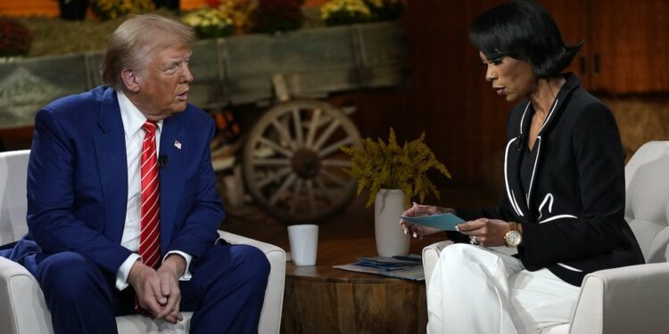 Republican presidential nominee former President Donald Trump speaks Oct. 15, 2024, during a break in a Fox News town hall with Harris Faulkner in Cumming, Ga. (AP)