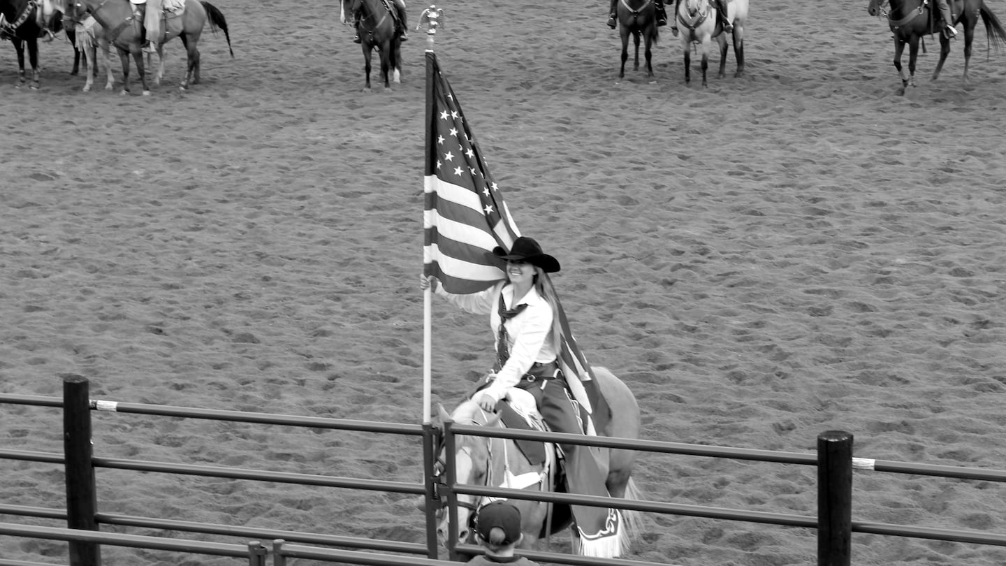 Maxine Harris, carrying the flag at the Snowmass Rodeo in Colorado on Aug. 21, has been the flag bearer there since 2013.