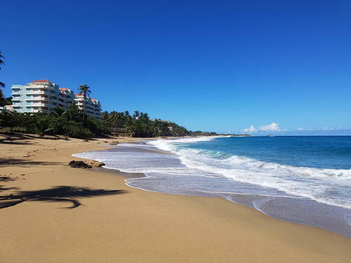 Sand And Ocean Water On Beach In Isabela, Puerto Rico
