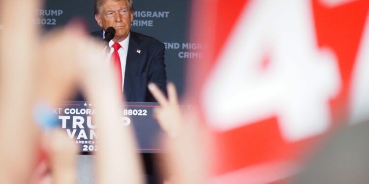 Trump attacks immigrants, repeats debunked gang takeover rhetoric in Aurora rally • Colorado Newsline