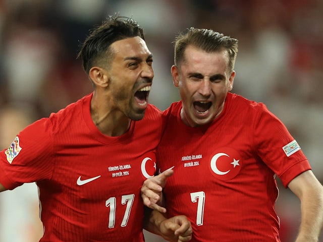 Turkey's Kerem Akturkoglu celebrates with teammate Can Kahveci on September 9, 2024