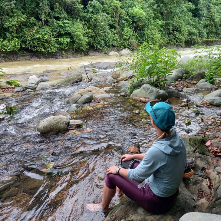 Jen Murphy treating herself to a foot bath in the Rio Naranjo in the foothills of the San Marcos de Tarrazú mountain range of Costa Rica