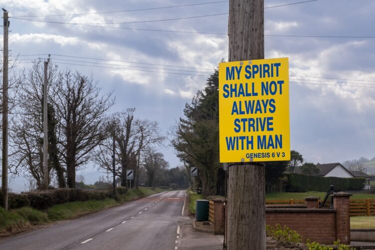 Scripture on public sign. Religion is prominent in public life in Ephrata.