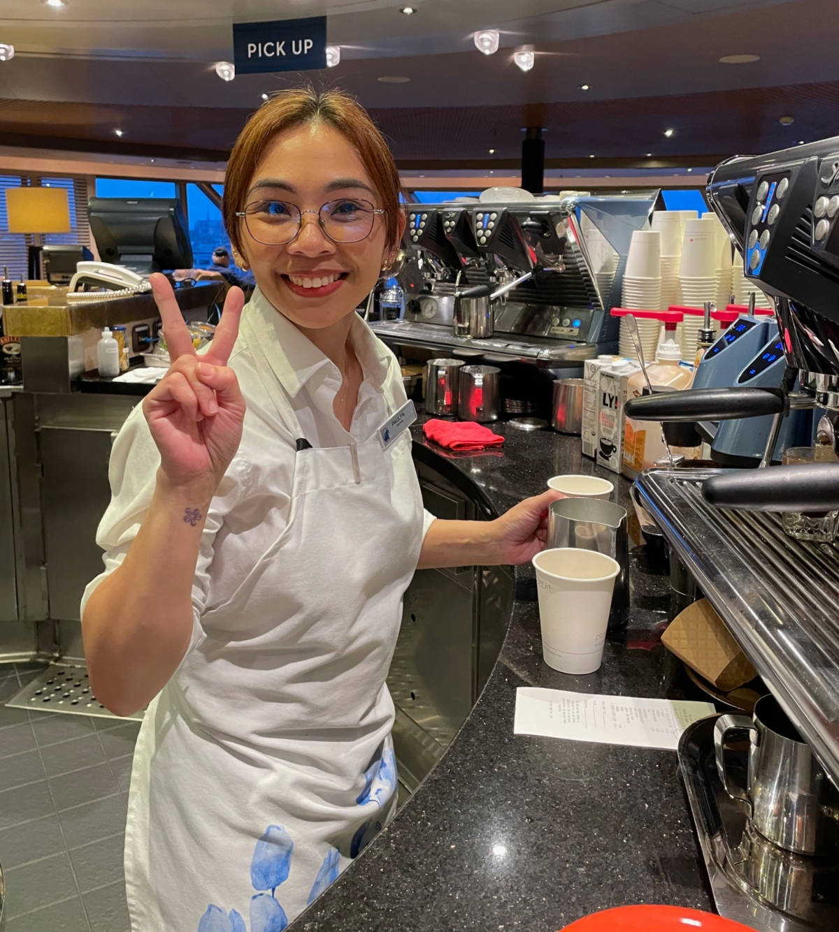 A barista at the Crow’s Nest coffee and cocktail bar