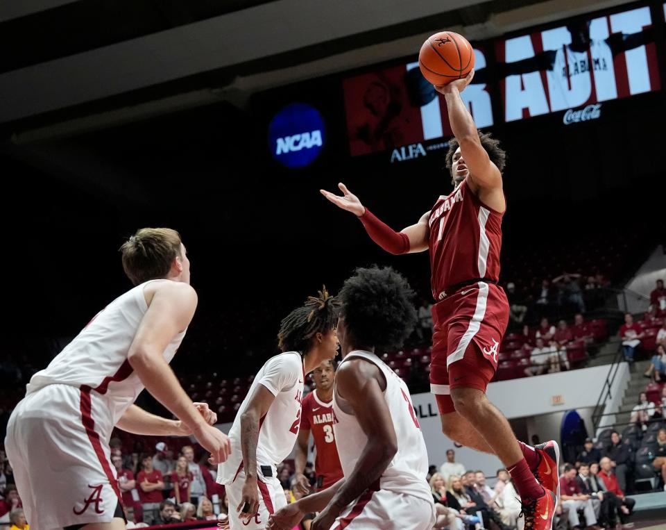 The University of Alabama unveiled the first banner honoring the school’s first Final Four appearance Friday, Oct. 11, 2024, in Coleman Coliseum. Alabama guard Mark Sears (1) sails in for a basket during the scrimmage following the unveiling.