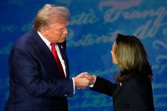 Republican presidential nominee former President Donald Trump shakes hands with Democratic presidential nominee Vice President Kamala Harris 