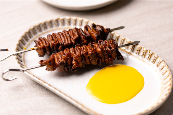 Ox-tongue anticuchos (skewers) with  carretillera sauce made with fresh Peruvian yellow chillies, served at Morena in Sydney and Barra in Melbourne.