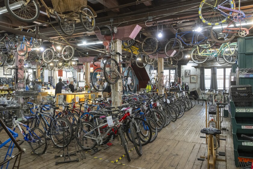 Dozens of bikes are lined up for sale at Working Bikes located in Little Village, Wednesday, Oct. 9, 2024.