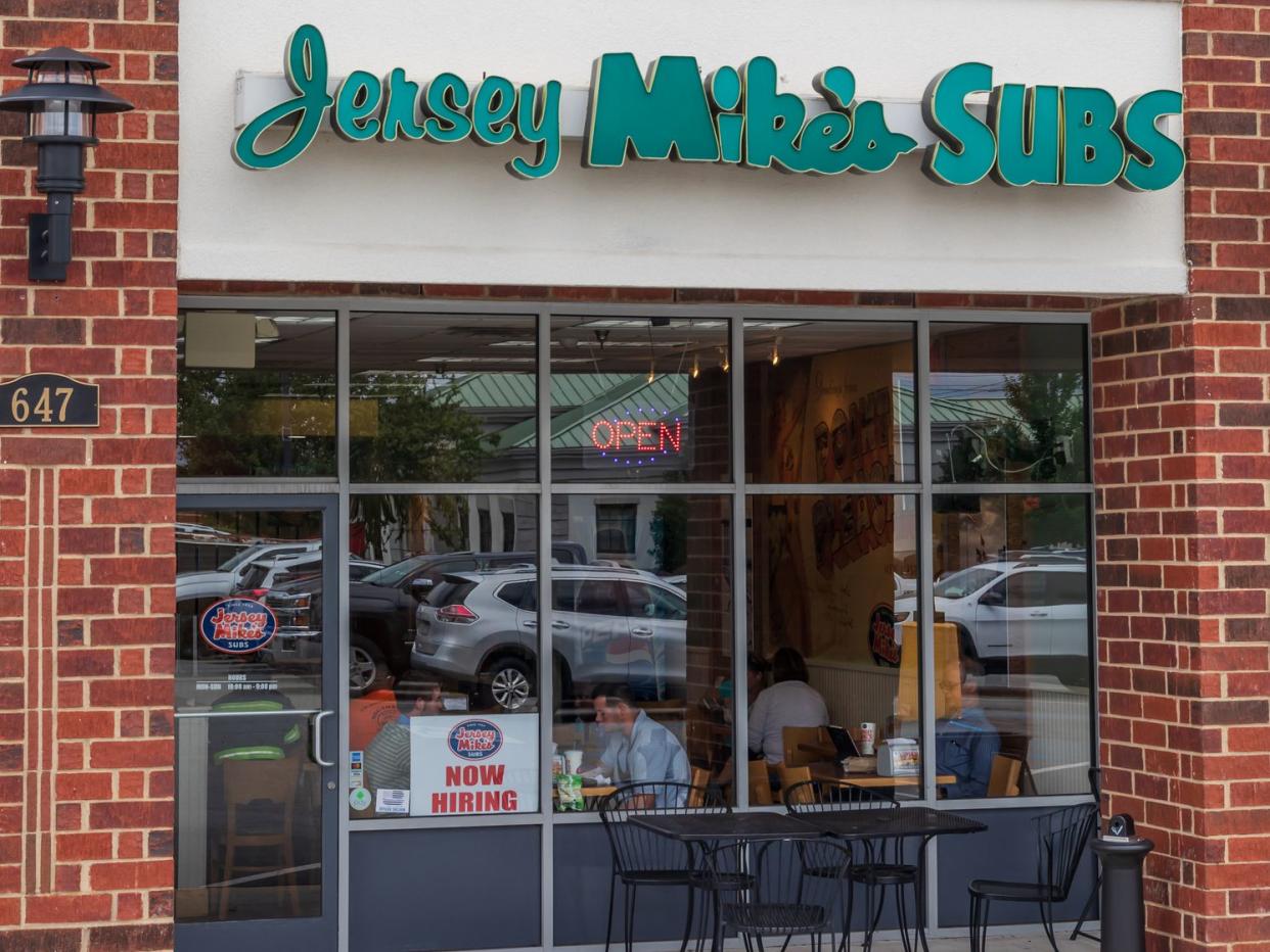 Mooresville, NC, USA-June 19, 2019: A local Jersey Mike's storefront, with outside seating.