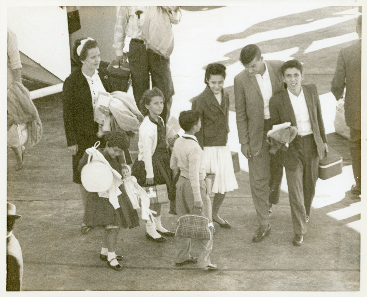 Barry University - Cuban children arrive at Miami Internation Airport