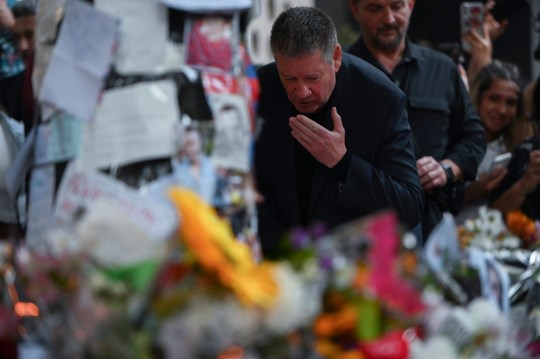 Geoff Payne, the father of One Direction pop singer Liam Payne, visits the place where fans paid tribute to his late son outside the Casa Sur Hotel in Buenos Aires on October 18, 2024