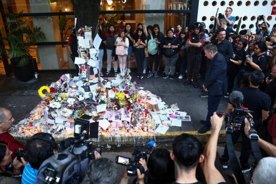 Geoff Payne, the father of One Direction pop singer Liam Payne, visits the place where fans paid tribute to his late son outside the Casa Sur Hotel in Buenos Aires on October 18, 2024