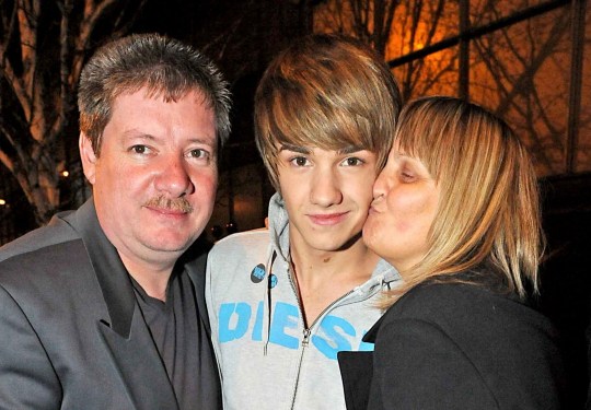 Liam Payne with parents Geoff and Karen, after the X Factor final outside Fountain Studios, London. December 12, 2010