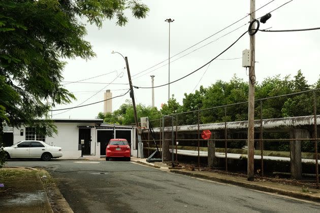 Pipelines run alongside residential homes in Cataño, Puerto Rico, a low-income neighborhood in the San Juan metropolitan area.