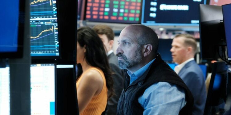 US stocks pull back from record levels as traders ready for big week of earnings