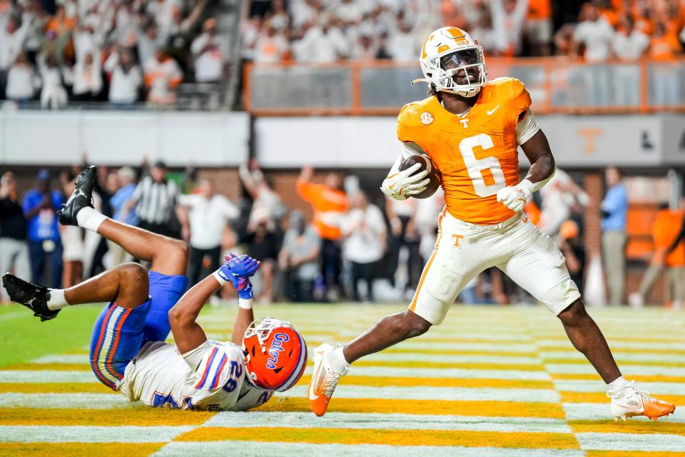 Oct 12, 2024; Knoxville, Tennessee, USA; Tennessee Volunteers running back Dylan Sampson (6) scores a touchdown against the Florida Gators at Neyland Stadium. Mandatory Credit: Brianna Paciorka/USA TODAY Network via Imagn Images