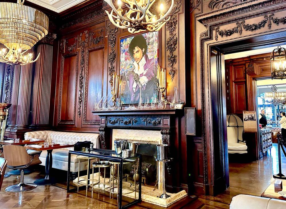 GORD MACKINTOSH / FREE PRESS
                                Casa Loma’s Oak Room oddly features the portrait Purple Reign.