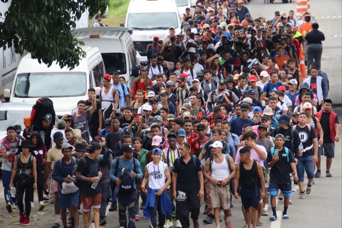 Migrants walk in a caravan in the municipality of Tapachula in the state of Chiapas, Mexico, October 20 2024