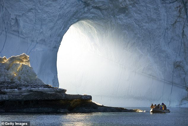 People on a raft next to icebergs (pictured). The island is known for its rich culture and breathtaking scenery