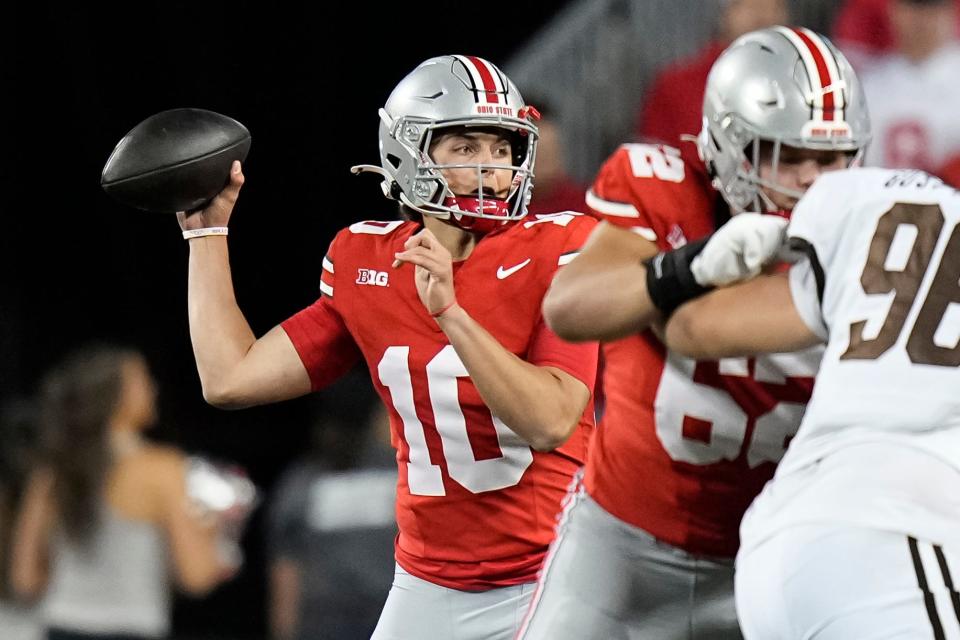 Sep 7, 2024; Columbus, Ohio, USA; Ohio State Buckeyes quarterback Julian Sayin (10) throws a pass against the Western Michigan Broncos during the second half at Ohio Stadium. Mandatory Credit: Adam Cairns-Imagn Images