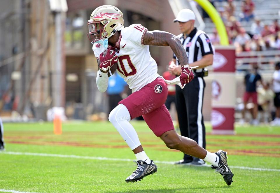 Apr 20, 2024; Tallahassee, Florida, USA; Florida State Seminoles wide receiver Malik Benson (10) runs with the ball during the Spring Showcase at Doak S. Campbell Stadium. Mandatory Credit: Melina Myers-USA TODAY Sports