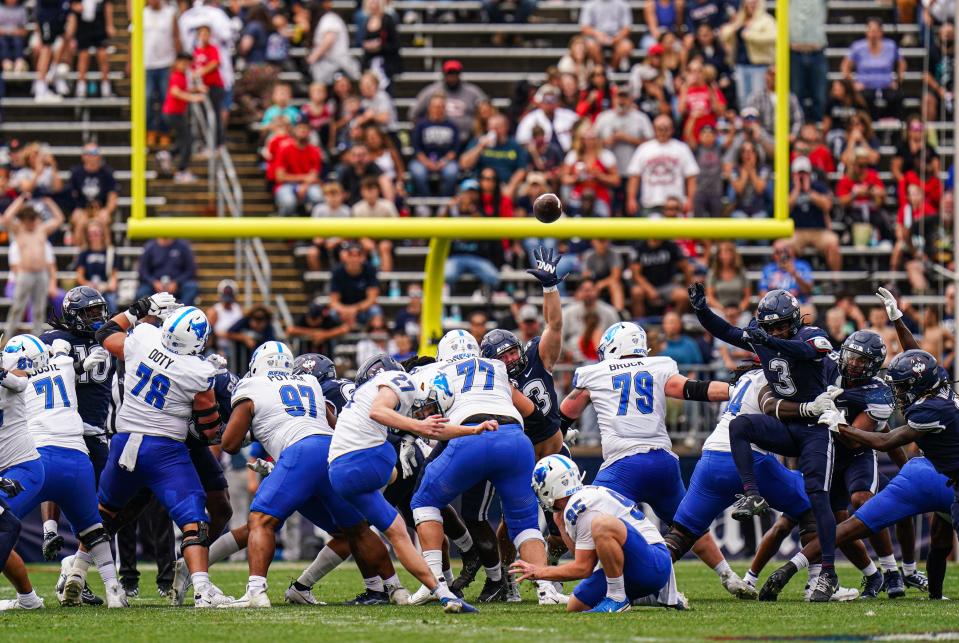 Sep 28, 2024; East Hartford, Connecticut, USA; Buffalo Bulls place kicker Upton Bellenfant (27) makes a field goal against the Connecticut Huskies in the second quarter at Rentschler Field at Pratt & Whitney Stadium. Mandatory Credit: David Butler II-Imagn Images